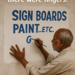 An elderly Indian sign painter with brushes and paints, creating a traditional hand-lettered shop sign on wood.