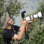 Lovish Garlani, butterfly researcher in Himachal Pradesh, documenting Himalayan butterfly ecology in the field.